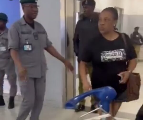 Woman who tore husband’s international passport arrested, flown to Abuja