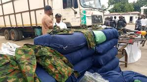 Police intercept truck carrying military camouflage, suspected drugs in Lagos, arrest three