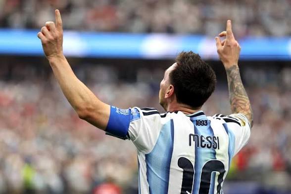 History-maker Messi’s brace fires Argentina into World Cup knockout stage